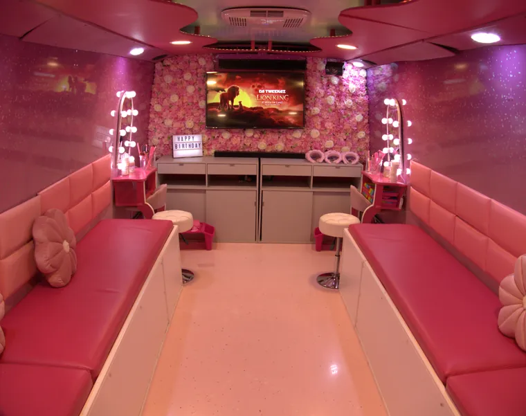 Inside the Pink Spa Bus — pink glam mirror stations